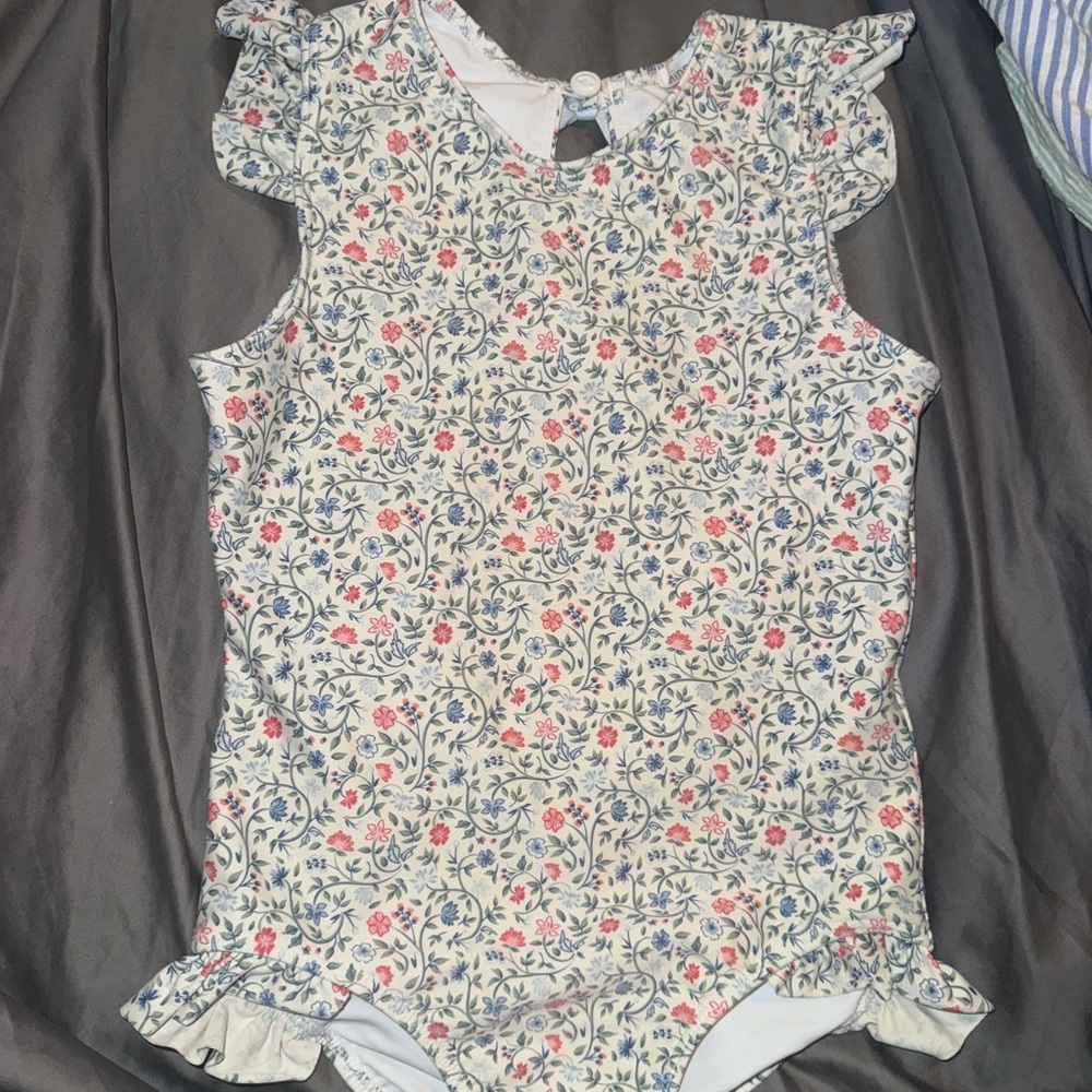 Blue and White One Piece Swim with Floral Print and Ruffled Legs